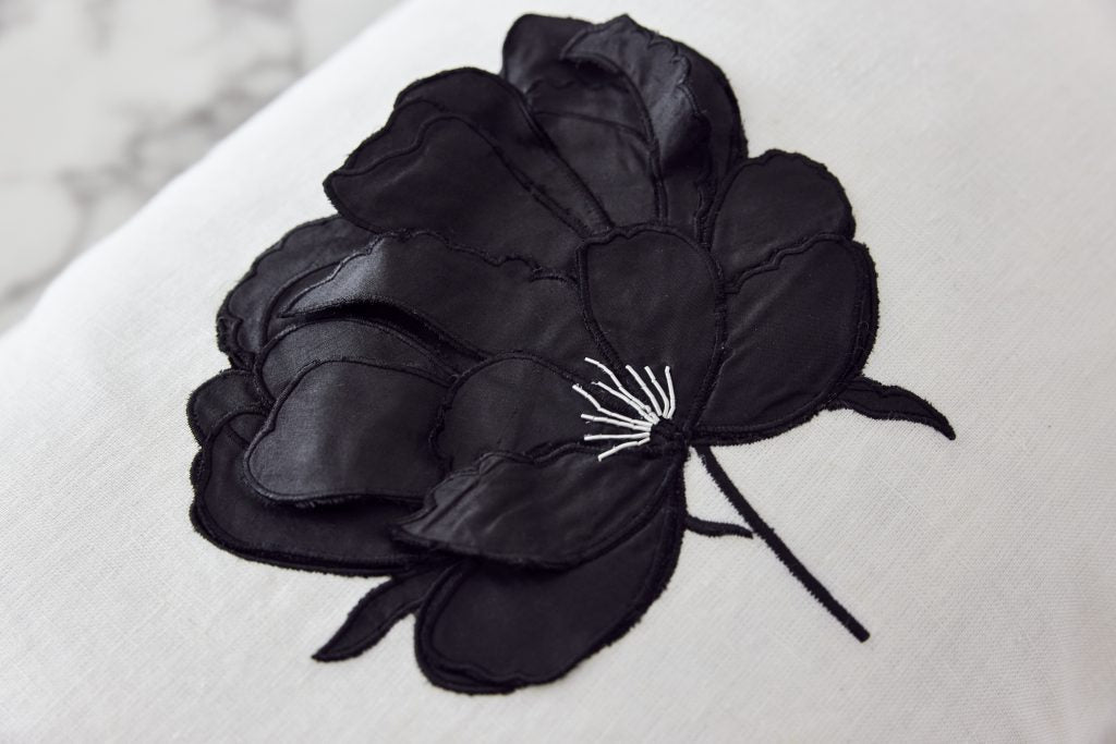 Ifuru Black Raw Silk Flower on White Linen cushion cover with Flange