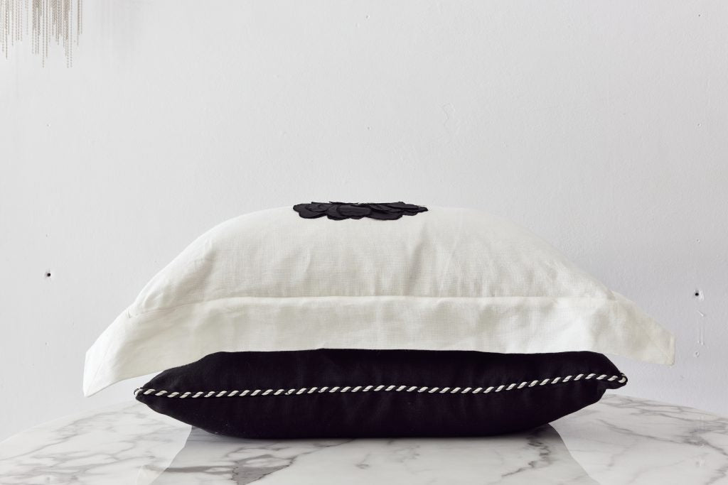 Ifuru Black Raw Silk Flower on White Linen cushion cover with Flange